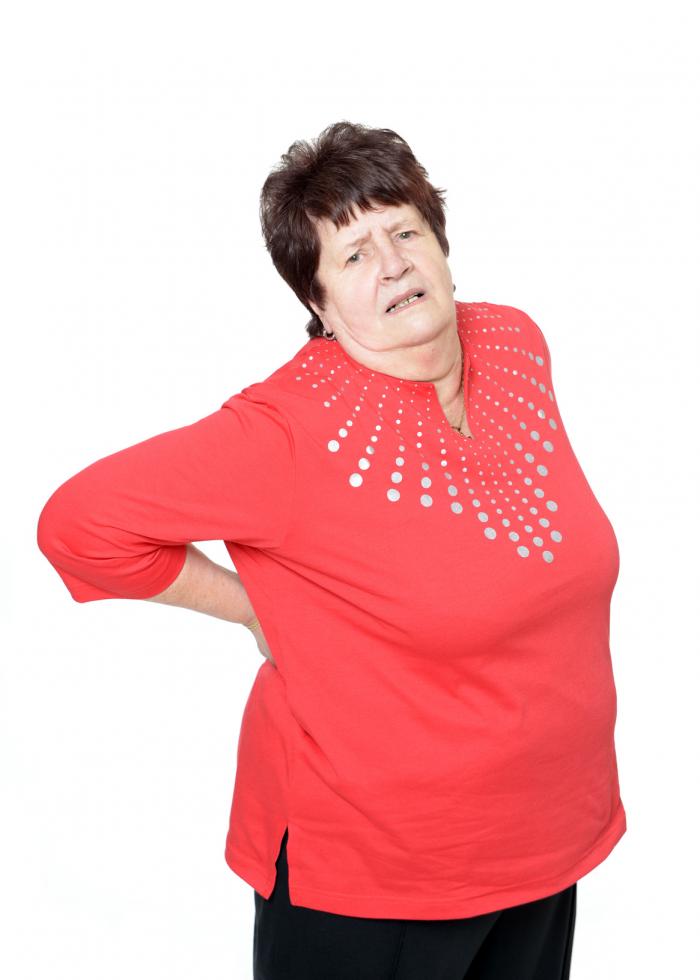 Lady with Backache Fotolia_49022349_M