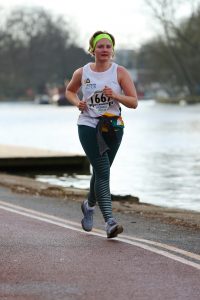 Arthritis Action volunteer running a marathon.